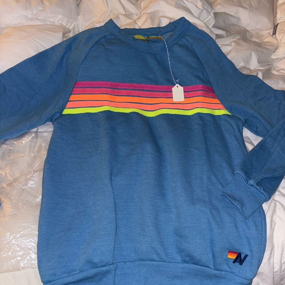 Aviator nation sweatshirt. Never worn. Size small. I bought & and forgot about